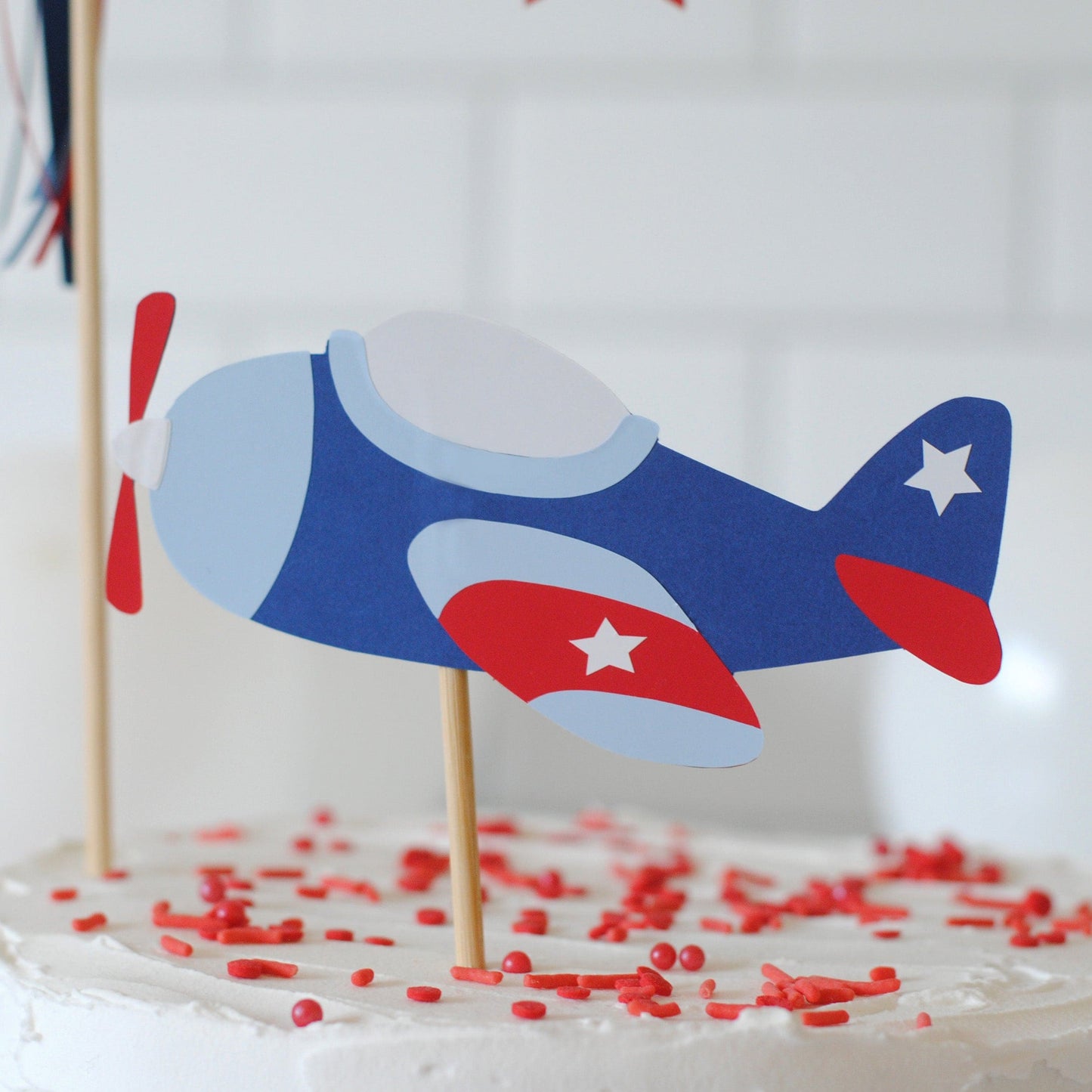 airplane theme birthday cake topper with plane and personalized name banner | cake topper by Avalon Sunshine