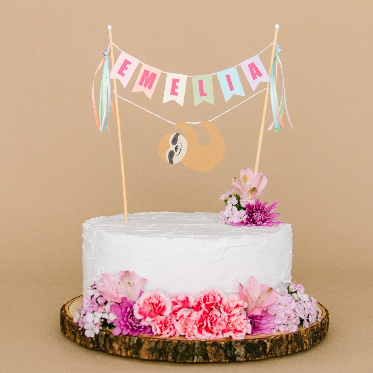 girls rainbow sloth cake topper with name banner and hanging sloth