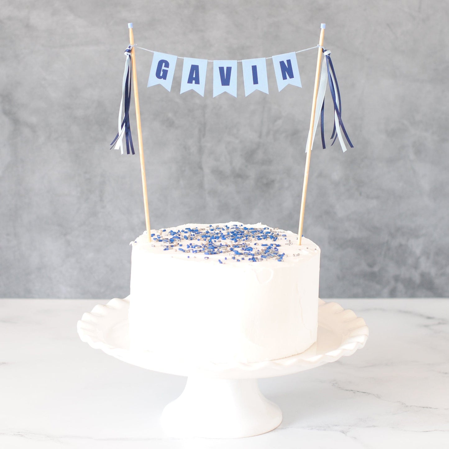 light blue and navy blue personalized name cake topper for kids birthday cake