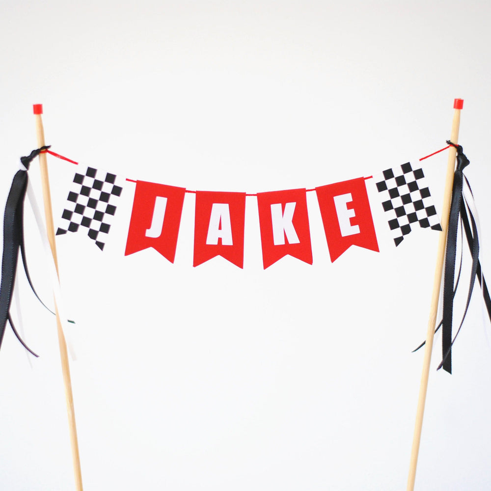 
                  
                    red and white race car theme birthday cake topper personalized with name and checkered flags
                  
                