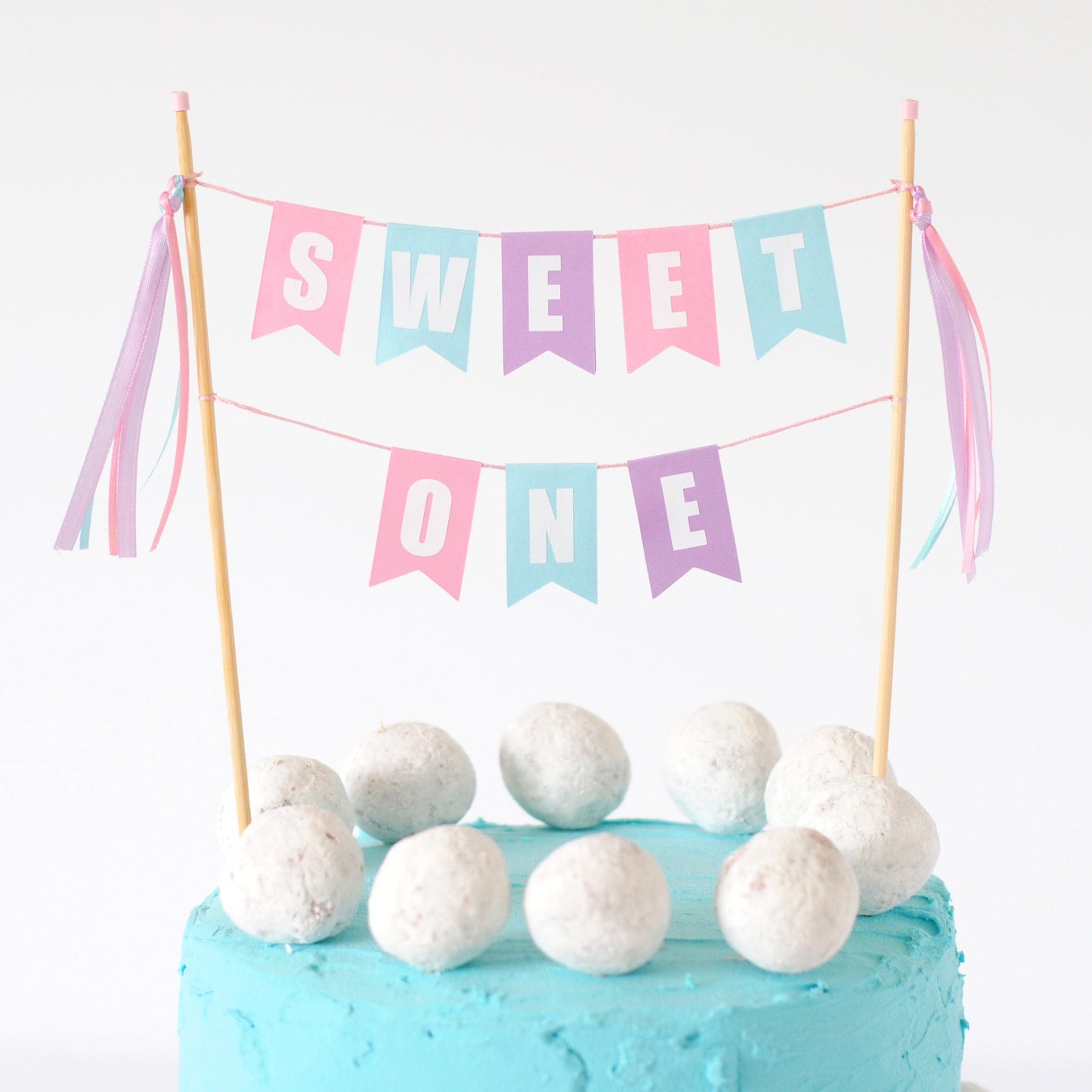 girls 1st birthday cake topper with wording SWEET ONE in pastel colors | cake topper made by Avalon Sunshine