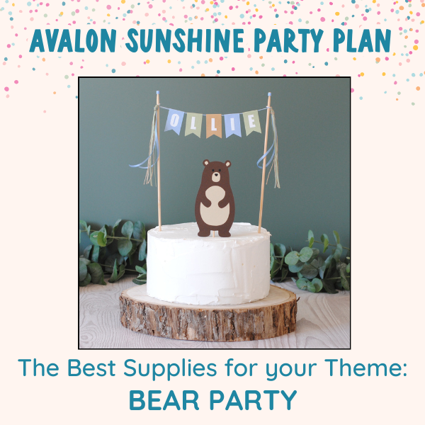 White birthday cake on a wood slice stand and a bear cake topper and name banner  | personalized cake toppers by Avalon Sunshine
