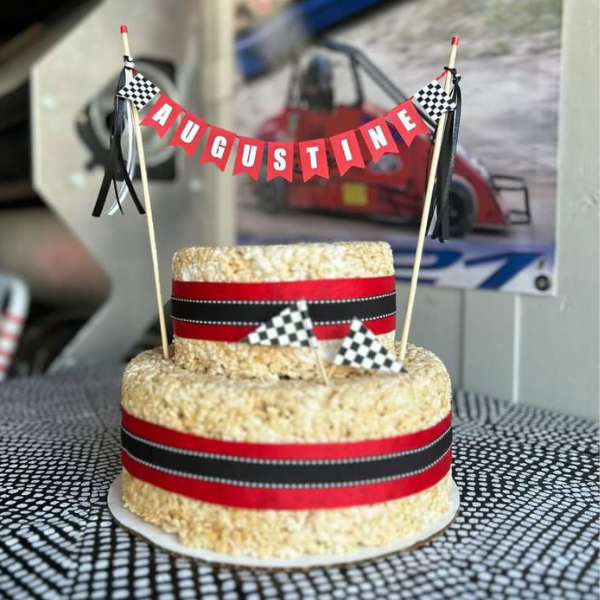 rice krispie birthday cake with race car theme and personalized race car cake topper