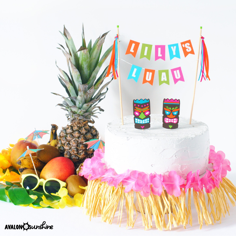 luau cake idea for birthday party with grass skirt cake stand | personalized cake toppers by Avalon Sunshine
