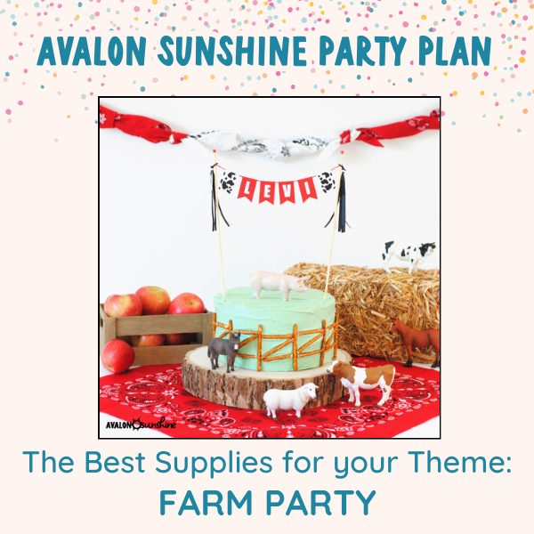 Farm theme birthday cake with name banner and cow print flags.  The cake is decorated with plastic farm animals with apples and hay in the background on a red bandana
