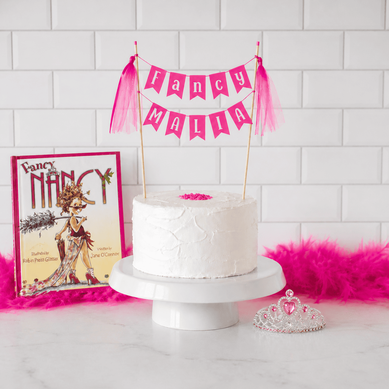 
                  
                    Fancy Nancy cake topper personalized with any name on the bottom row. 
                  
                