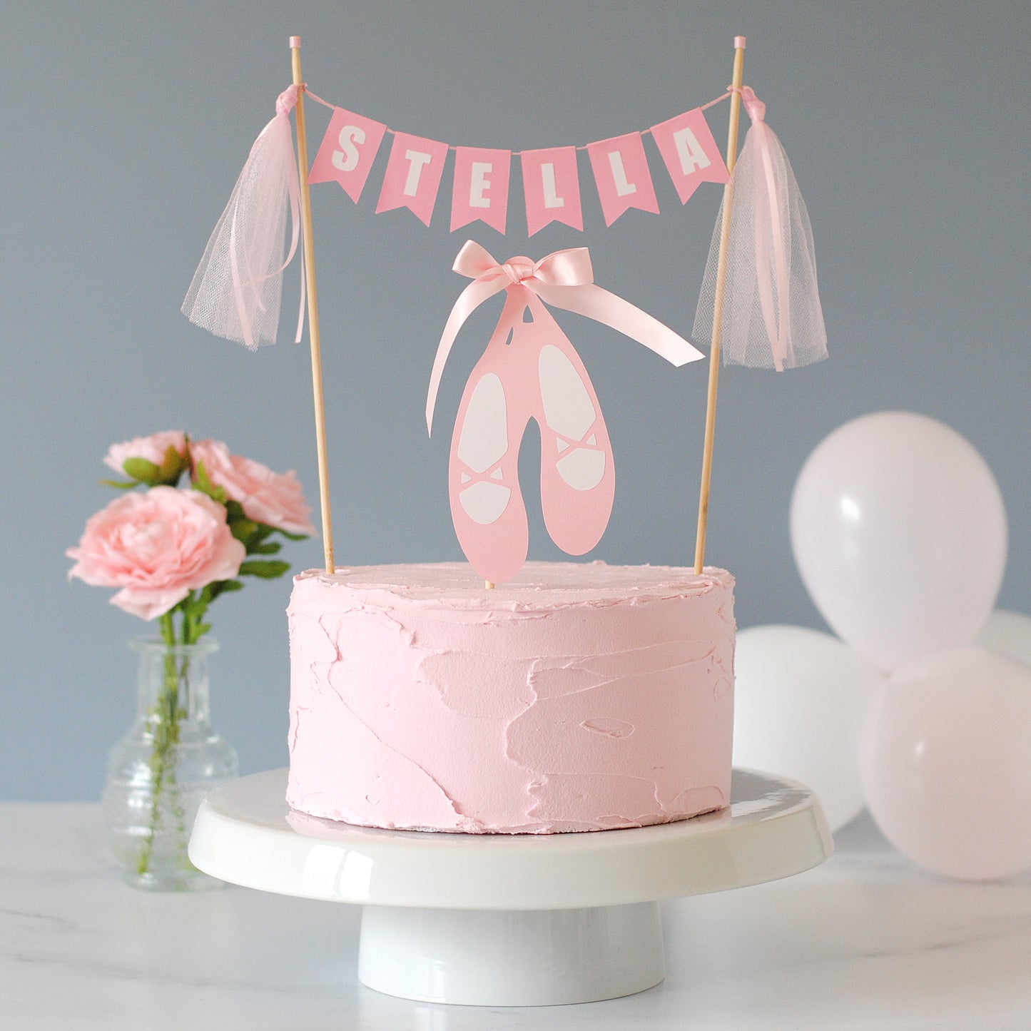Pink cake with pink personalized name banner and ballet slipper topper | Personalized cake toppers by Avalon Sunshine