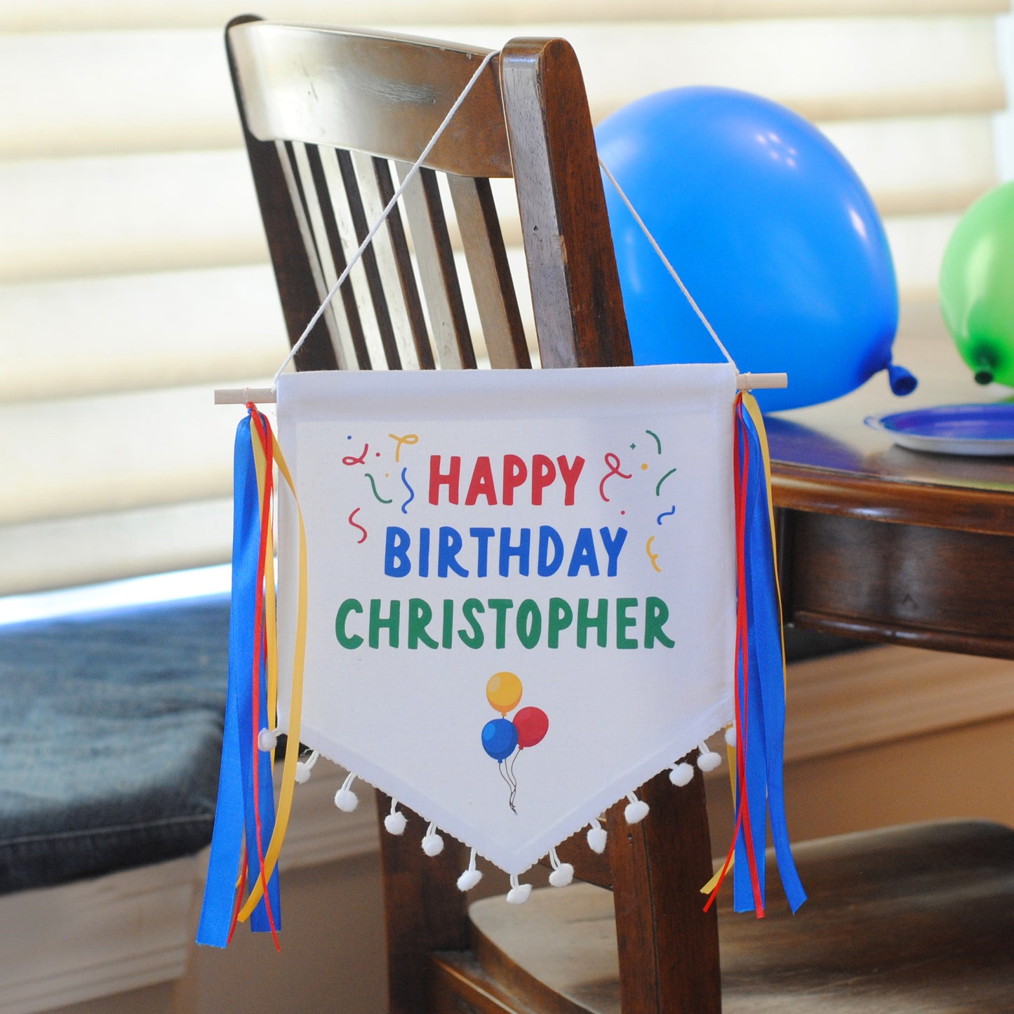 Happy Birthday canvas banner with pom pom trim and ribbon tassels personalized with name 