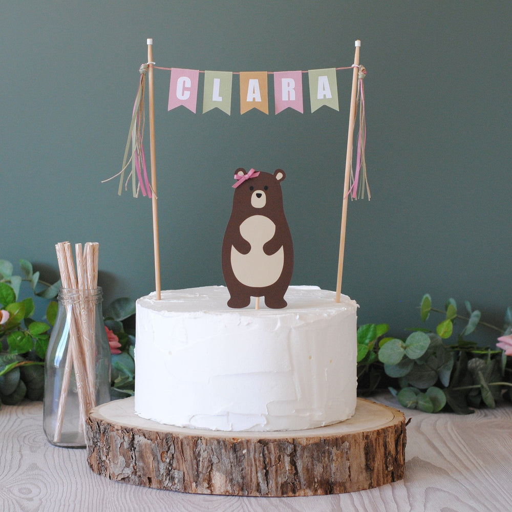 
                  
                    Bear birthday cake topper with matching name banner in pink and green | personalized cake toppers by Avalon Sunshine
                  
                