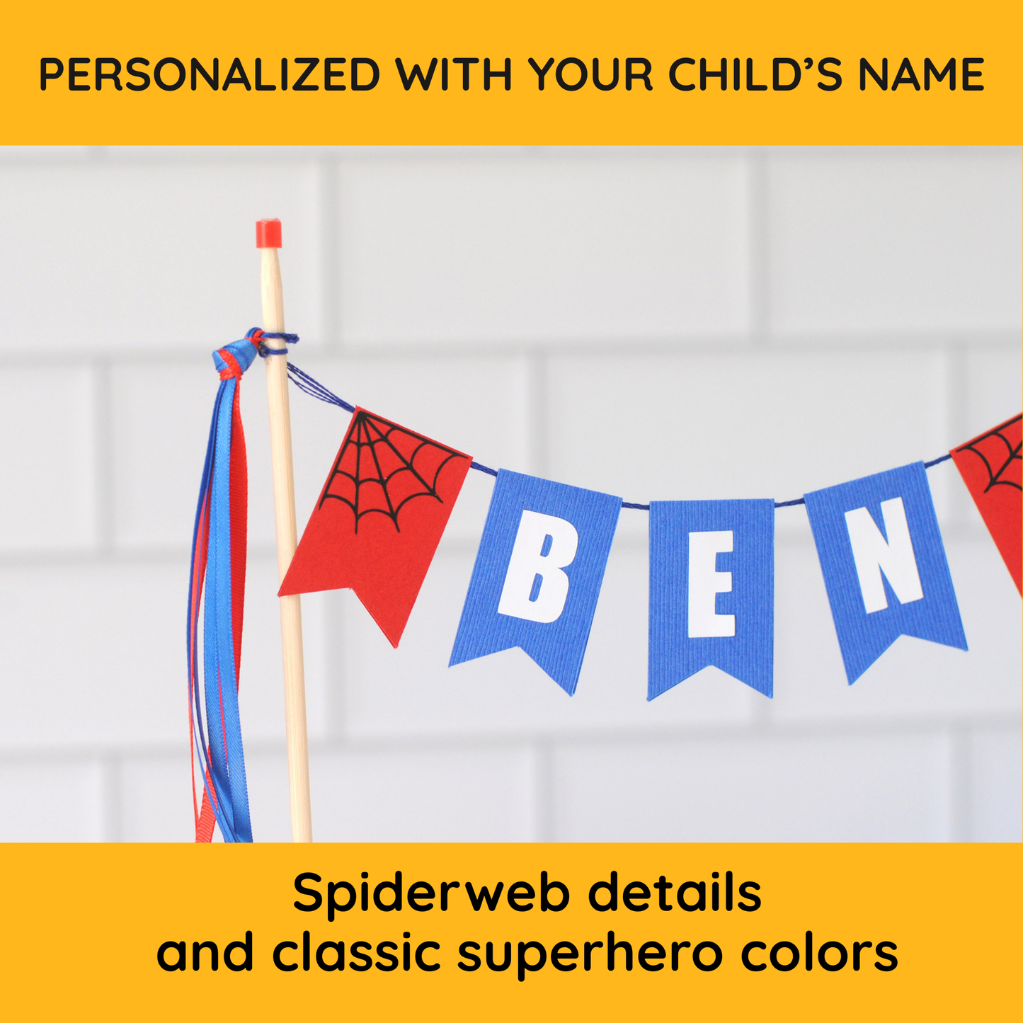 
                  
                    close up view of personalized spiderman cake topper showing black web design on red flags next to the name banner
                  
                