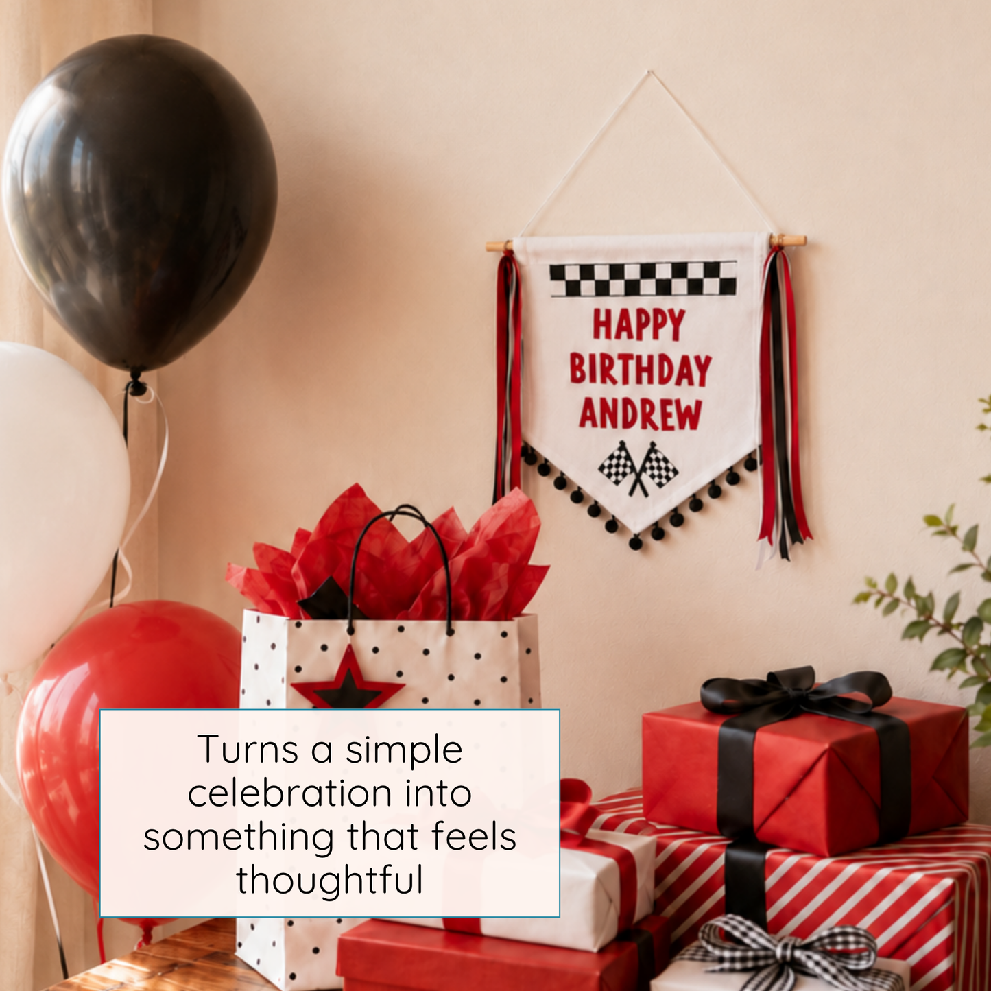 
                  
                    Birthday decorations with balloons, gift bags, and a personalized racing theme birthday banner on a wall.
                  
                