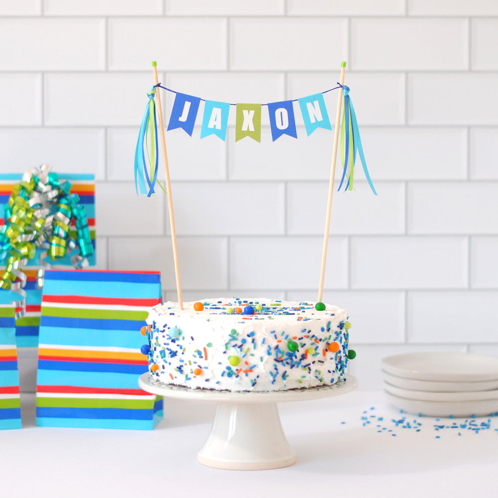 
                  
                    boys birthday cake topper with alternating colors royal blue, turquoise and lime green | cake topper made by Avalon Sunshine
                  
                
