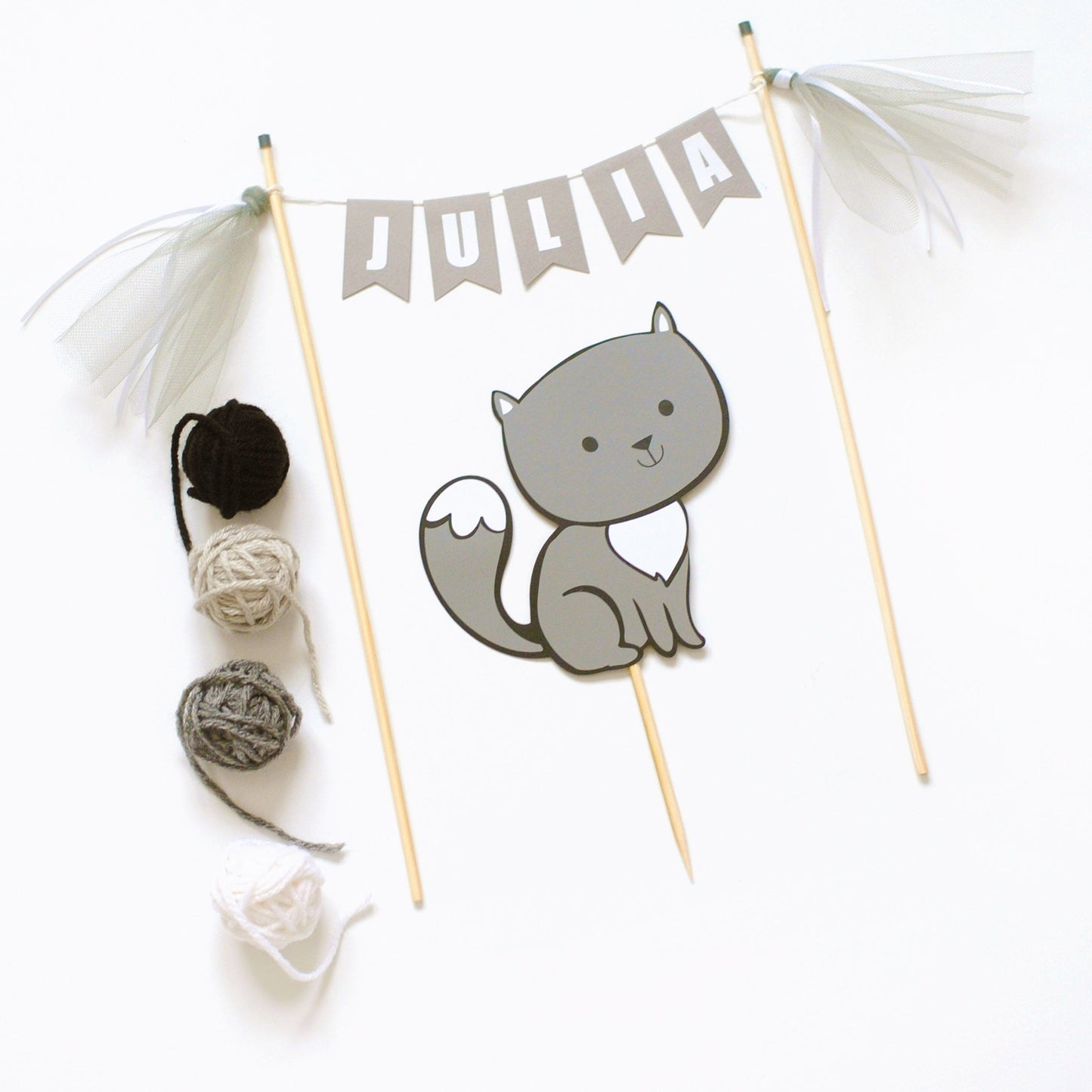 
                  
                    grey cat cake topper set with name banner and tulle tassels
                  
                