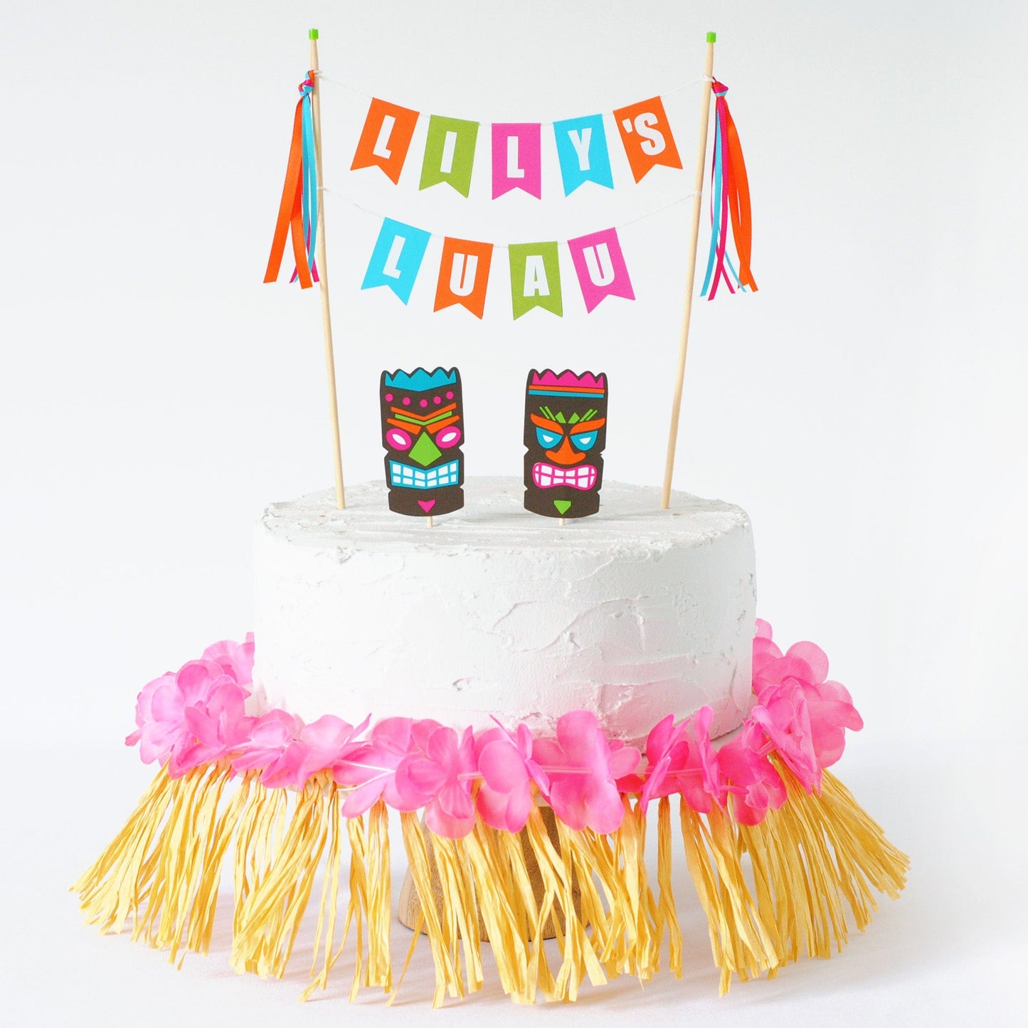 
                  
                    Hawaiian luau birthday cake topper with name and tiki masks
                  
                
