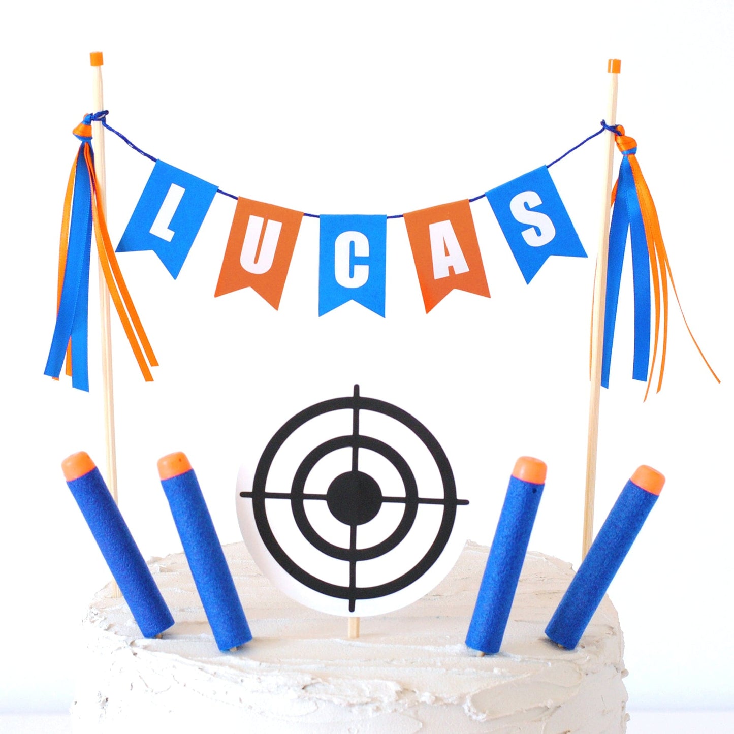 
                  
                    nerf cake topper set with personalized name banner, round target and foam darts
                  
                