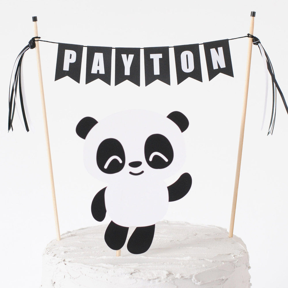 
                  
                    panda birthday cake topper set with paper panda and personalized name banner in black and white
                  
                