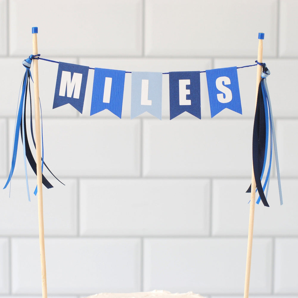 
                  
                    boys birthday cake topper in shades of blue
                  
                